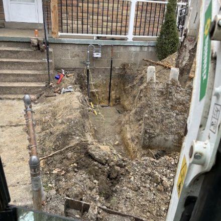 Open excavation at a front entry