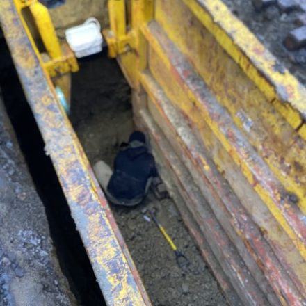 Shored trench for a utility line replacement